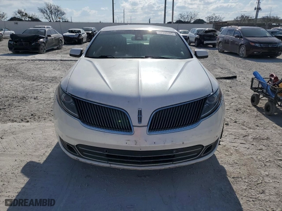 2013 Lincoln MKS with VIN 1LNHL9DK3DG617279, listed as a Copart auction lot 52396305 with 135,409 mi miles and Clean Title. Bid and sale history available at carsss.com. Image 5.