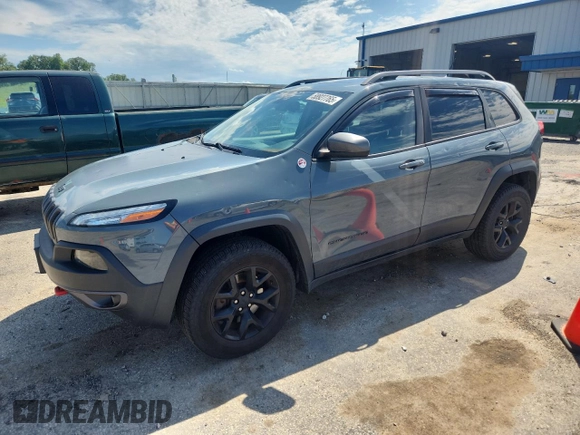 2015 Jeep Cherokee Trailhawk with VIN 1C4PJMBS4FW687328, listed as a Copart auction lot 58927765 with 119,483 mi miles and Non repairable. Bid and sale history available at DreamBid. Image 1.