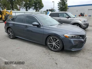 2022 Honda Civic Touring z VIN 2HGFE1F93NH314236, wystawiony jako Copart lot #53380915 z przebiegiem 25 302 mil mil oraz Szkoda całkowita • Salvage title. Historia ofert i sprzedaży dostępna na DreamBid. Obrazek 4.