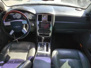 2005 Chrysler 300 with VIN 2C3AA63H35H659798, listed as a Copart auction lot 50322065 with 153,944 mi miles and Salvage Title. Bid and sale history available at carsss.com. Image 8.