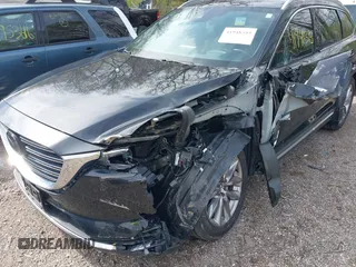 2020 Mazda CX-9 Grand Touring with VIN JM3TCBDY3L0419049, listed as a IAAI auction lot 41948393 with 70,163 mi miles and . Bid and sale history available at DreamBid. Image 6.