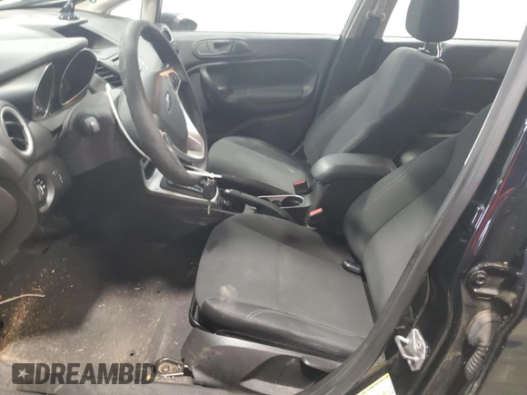2019 Ford Fiesta SE z VIN 3FADP4BJ9KM151046, wystawiony jako Copart lot #56862255 z przebiegiem 77 002 mil mil oraz Czysty tytuł • Clean title. Historia ofert i sprzedaży dostępna na DreamBid. Obrazek 7.