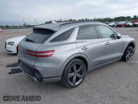 2023 Genesis GV70 Sport with VIN KMUMCDTC1PU098851, listed as a IAAI auction lot 41864774 with 15,016 mi miles and . Bid and sale history available at DreamBid. Image 4.
