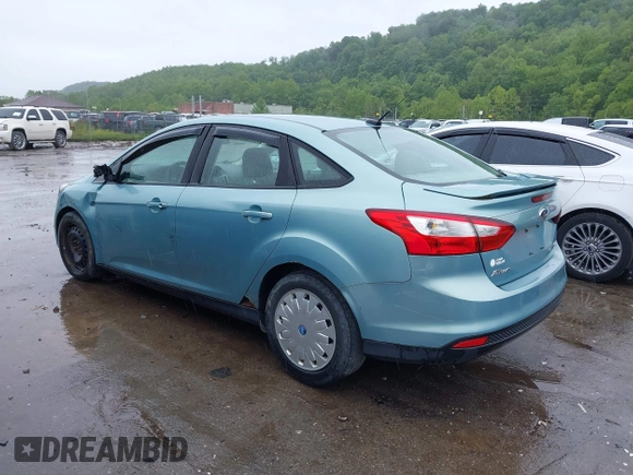 2012 Ford Focus SE with VIN 1FAHP3F21CL226033, listed as a IAAI auction lot 42368786 with 168,061 mi miles and . Bid and sale history available at DreamBid. Image 3.