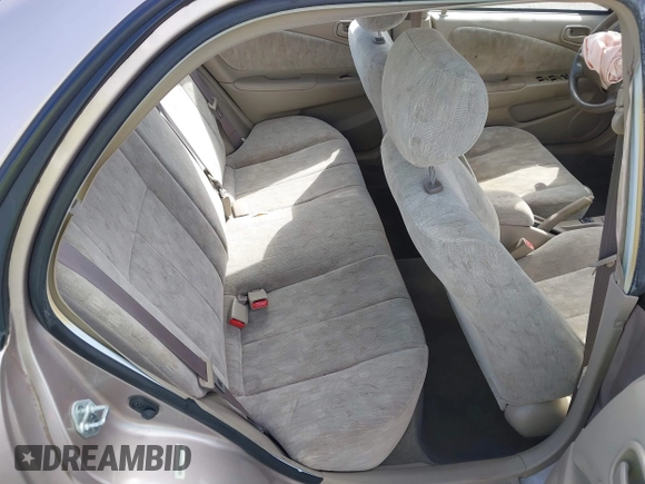 1999 Toyota Corolla VE with VIN 1NXBR12E4XZ182751, listed as a IAAI auction lot 41433066 with 56,904 mi miles and . Bid and sale history available at DreamBid. Image 8.