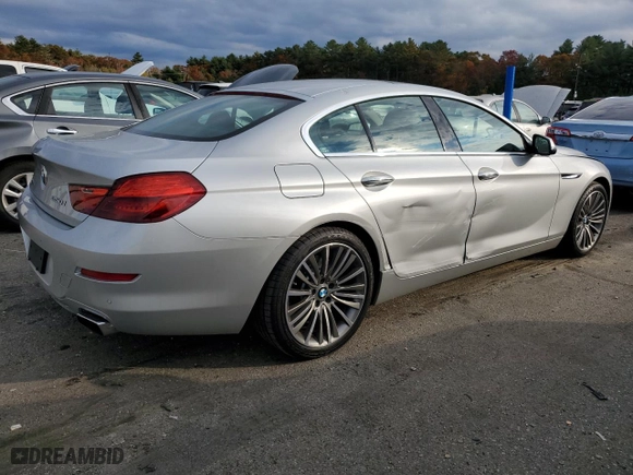 2016 BMW 6 Series 650i xDrive with VIN WBA6D6C52GG387898, listed as a Copart auction lot 77109254 with 106,134 mi miles and Salvage Title. Bid and sale history available at carsss.com. Image 3.