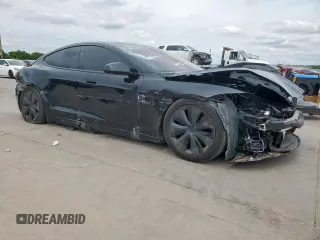 2023 Tesla Model S with VIN 5YJSA1E59PF512318, listed as a Copart auction lot 58377895 with 34,402 mi miles and Salvage title. Bid and sale history available at DreamBid. Image 4.