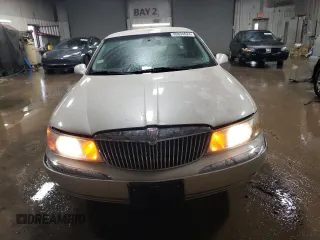 2000 Lincoln Continental with VIN 1LNHM97V2YY760288, listed as a Copart auction lot 80894624 with 115,785 mi miles and Salvage Title. Bid and sale history available at carsss.com. Image 5.