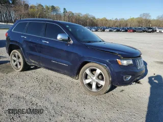 2014 Jeep Grand Cherokee Overland with VIN 1C4RJECG7EC322425, listed as a Copart auction lot 50346275 with 262,886 mi miles and Salvage Title. Bid and sale history available at carsss.com. Image 4.