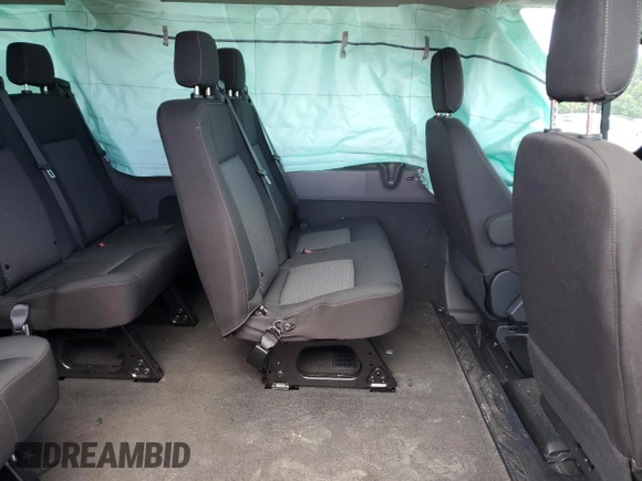 2023 Ford Transit Passenger XL with VIN 1FBAX2X86PKB35851, listed as a Copart auction lot 71126324 with 8,402 mi miles and Salvage Title. Bid and sale history available at DreamBid. Image 11.