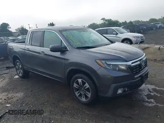 2017 Honda Ridgeline RTL with VIN 5FPYK3F52HB032017, listed as a IAAI auction lot 42688518 with 166,647 mi miles and . Bid and sale history available at DreamBid. Image 1.