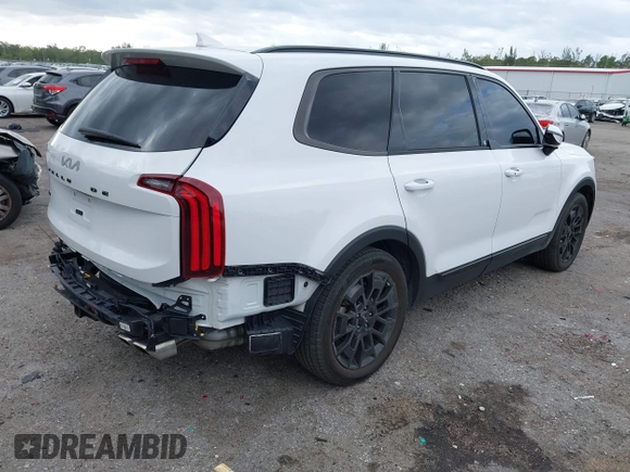 2022 Kia Telluride SX with VIN 5XYP5DHC8NG308797, listed as a IAAI auction lot 41907333 with 65,447 mi miles and . Bid and sale history available at carsss.com. Image 4.