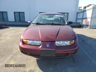 2001 Saturn SL z VIN 1G8ZK54731Z305098, wystawiony jako Copart lot #83875424 z przebiegiem 82 879 mil mil oraz Tytuł czysty. Historia ofert i sprzedaży dostępna na DreamBid. Obrazek 5.