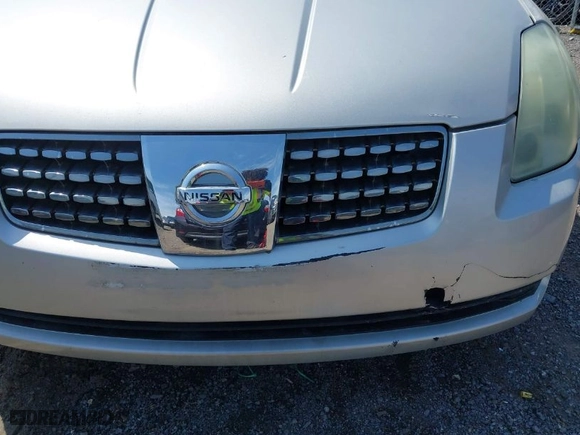 2004 Nissan Maxima SL with VIN 1N4BA41E84C822059, listed as a IAAI auction lot 42032195 with 213,650 mi miles. Bid and sale history available at carsss.com. Image 6.