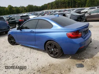 2016 BMW 2 Series M235i xDrive with VIN WBA1J9C52GV372057, listed as a Copart auction lot 71236354 with 89,420 mi miles and Salvage Title. Bid and sale history available at carsss.com. Image 2.