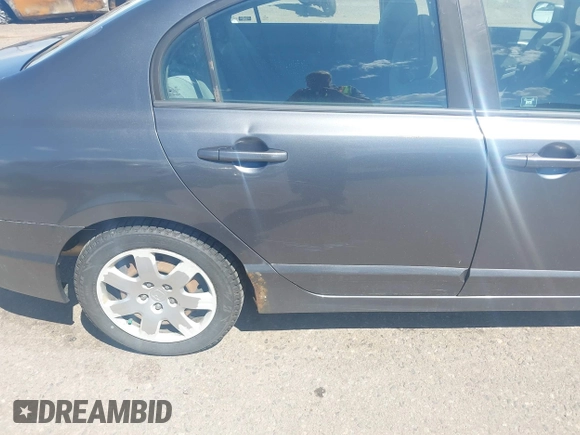 2009 Honda Civic LX z VIN 19XFA165X9E039697, wystawiony jako IAAI lot #39794063 z przebiegiem 169 439 mil mil oraz . Historia ofert i sprzedaży dostępna na DreamBid. Obrazek 6.