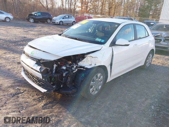 2022 Kia Rio S with VIN 3KPA25AD5NE443465, listed as a IAAI auction lot 41230852 with 20,460 mi miles and . Bid and sale history available at DreamBid. Image 18.