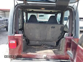 2001 Jeep Wrangler SE с VIN 1J4FA29P21P300094, выставлен на аукционе IAAI как лот 41871446 с пробегом 125 098 миль миль и . История ставок и продаж доступна на DreamBid. Изображение 17.