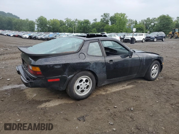 1987 Porsche 944 z VIN WP0AB0946HN474232, wystawiony jako Copart lot #64654684 z przebiegiem 87 126 mil mil oraz Szkoda całkowita • Salvage title. Historia ofert i sprzedaży dostępna na DreamBid. Obrazek 3.