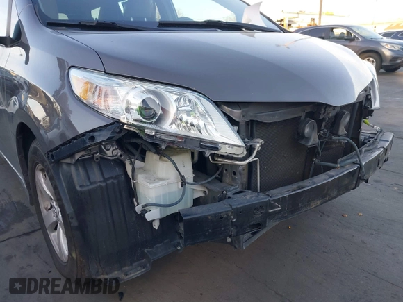 2018 Toyota Sienna L with VIN 5TDZZ3DC0JS965524, listed as a IAAI auction lot 41608423 with 63,815 mi miles and . Bid and sale history available at DreamBid. Image 12.