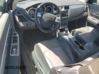 2008 Chrysler Sebring Touring z VIN 1C3LC55R48N181096, wystawiony jako Copart lot #56965745 z przebiegiem 125 873 mil mil oraz Szkoda całkowita • Salvage title. Historia ofert i sprzedaży dostępna na DreamBid. Obrazek 8.