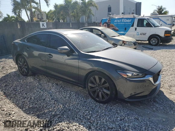 2018 Mazda 6 Grand Touring with VIN JM1GL1TY6J1303258, listed as a Copart auction lot 48738325 with 64,169 mi miles and Salvage Title. Bid and sale history available at DreamBid. Image 4.