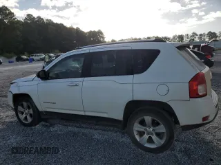 2012 Jeep Compass Latitude with VIN 1C4NJCEA2CD666392, listed as a Copart auction lot 77044444 with 175,283 mi miles and Salvage Title. Bid and sale history available at DreamBid. Image 2.