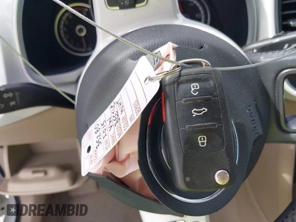 2015 Volkswagen Beetle 1.8T w/Tech with VIN 3VW517AT4FM812294, listed as a IAAI auction lot 41753967 with 59,857 mi miles and . Bid and sale history available at DreamBid. Image 11.