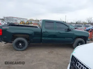 2015 Chevrolet Silverado 1500 LT with VIN 1GCVKREC1FZ342326, listed as a IAAI auction lot 41968095 with 119,911 mi miles and . Bid and sale history available at DreamBid. Image 13.