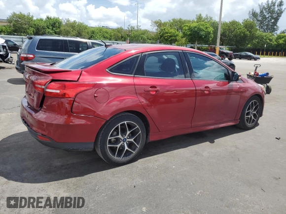 2015 Ford Focus SE z VIN 1FADP3F24FL332883, wystawiony jako Copart lot #64429655 z przebiegiem 65 939 mil mil oraz Szkoda całkowita • Salvage title. Historia ofert i sprzedaży dostępna na DreamBid. Obrazek 3.