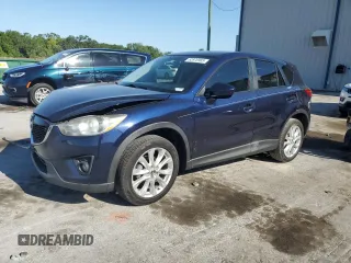 2014 Mazda CX-5 Grand Touring with VIN JM3KE2DY8E0361108, listed as a Copart auction lot 52876965 with 116,135 mi miles and Salvage Title. Bid and sale history available at carsss.com. Image 1.
