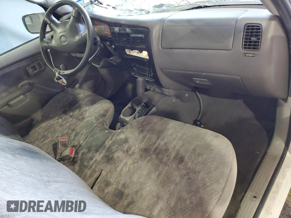 2004 Toyota Tacoma with VIN 5TENL42N54Z412126, listed as a Copart auction lot 59111655 with 252,441 mi miles and Salvage title. Bid and sale history available at DreamBid. Image 8.