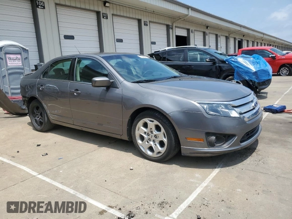 2010 Ford Fusion SE with VIN 3FAHP0HA4AR387638, listed as a Copart auction lot 60649585 with 210,779 mi miles and Salvage title. Bid and sale history available at DreamBid. Image 4.