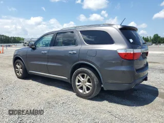 2013 Dodge Durango Crew with VIN 1C4SDJDT4DC696390, listed as a Copart auction lot 63608365 with 176,285 mi miles and Clean title. Bid and sale history available at DreamBid. Image 2.