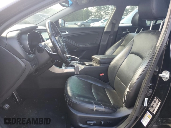 2015 Kia Optima SX z VIN 5XXGR4A71FG437987, wystawiony jako Copart lot #56657475 z przebiegiem 146 403 mil mil oraz Szkoda całkowita • Salvage title. Historia ofert i sprzedaży dostępna na DreamBid. Obrazek 7.
