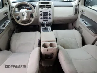 2009 Mercury Mariner with VIN 4M2CU81G49KJ16972, listed as a Copart auction lot 72354504 with 148,966 mi miles and Salvage title. Bid and sale history available at DreamBid. Image 8.