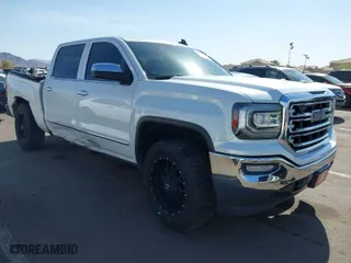 2016 GMC Sierra 1500 SLT with VIN 3GTU2NEJ4GG205370, listed as a IAAI auction lot 41989400 with 114,994 mi miles. Bid and sale history available at carsss.com. Image 1.