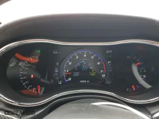 2021 Jeep Grand Cherokee SRT with VIN 1C4RJFDJ1MC561144, listed as a Copart auction lot 83961214 with 49,989 mi miles and Salvage Title. Bid and sale history available at carsss.com. Image 9.
