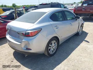 2017 Toyota Yaris iA with VIN 3MYDLBYV2HY161909, listed as a IAAI auction lot 41984206 with 128,898 mi miles. Bid and sale history available at carsss.com. Image 4.