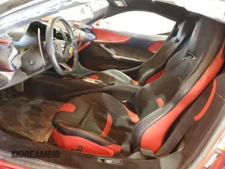 2021 Ferrari SF90 z VIN ZFF95NLA8M0263161, wystawiony jako Copart lot #44430285 z przebiegiem 6090 mil mil oraz Tytuł czysty. Historia ofert i sprzedaży dostępna na DreamBid. Obrazek 7.