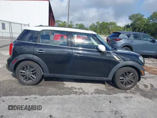 2013 MINI Countryman S z VIN WMWZC3C5XDWP24270, wystawiony jako IAAI lot #42232550 z przebiegiem 95 512 mil mil oraz . Historia ofert i sprzedaży dostępna na DreamBid. Obrazek 13.