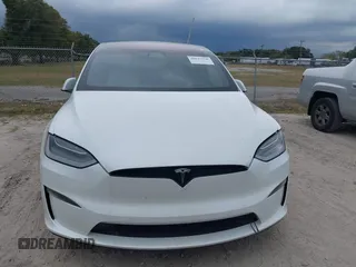 2022 Tesla Model X with VIN 7SAXCBE56NF364067, listed as a IAAI auction lot 40947378 with Not Provided miles and . Bid and sale history available at DreamBid. Image 6.