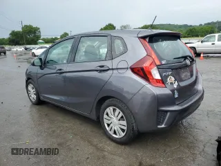 2015 Honda Fit LX с VIN 3HGGK5G59FM731945, выставлен на аукционе Copart как лот 61272285 с пробегом 126 060 миль миль и Списание • Salvage title. История ставок и продаж доступна на DreamBid. Изображение 2.