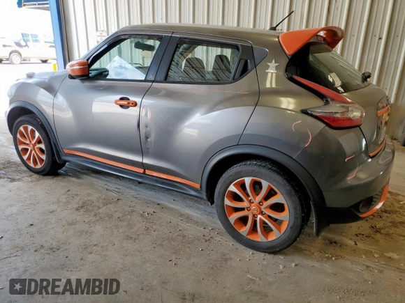 2015 Nissan Juke SV with VIN JN8AF5MV5FT552577, listed as a Copart auction lot 58601095 with 121,896 mi miles and Salvage title. Bid and sale history available at DreamBid. Image 2.