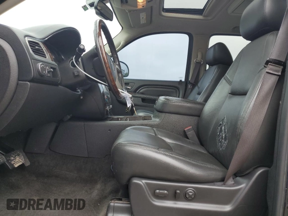 2013 GMC Yukon Denali with VIN 1GKS1EEFXDR212216, listed as a Copart auction lot 51215745 with 180,669 mi miles and Salvage Title. Bid and sale history available at carsss.com. Image 7.