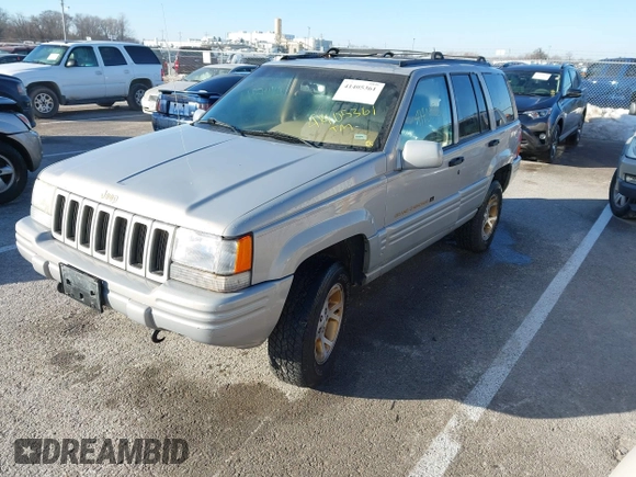 1997 Jeep Grand Cherokee Limited with VIN 1J4GZ78Y8VC718435, listed as a IAAI auction lot 41405361 with 210,599 mi miles. Bid and sale history available at carsss.com. Image 2.