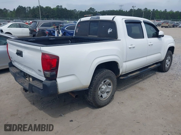 2022 Toyota Tacoma SR with VIN 3TYCZ5AN9NT098903, listed as a IAAI auction lot 42088505 with 93,000 mi miles and . Bid and sale history available at DreamBid. Image 4.