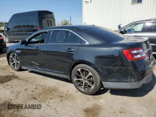 2015 Ford Taurus SEL with VIN 1FAHP2E89FG180089, listed as a Copart auction lot 58445555 with 151,240 mi miles and Salvage title. Bid and sale history available at DreamBid. Image 2.