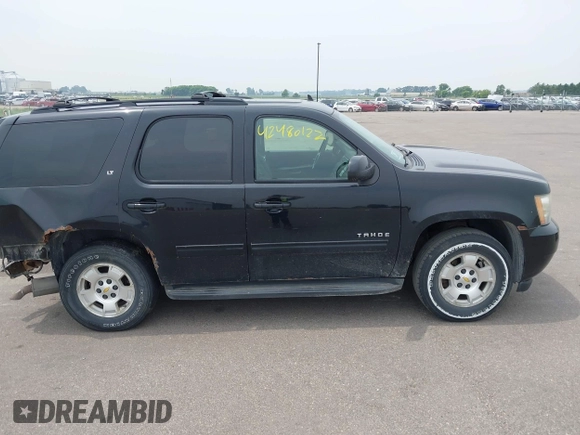 2009 Chevrolet Tahoe 1LT z VIN 1GNFK23009R297220, wystawiony jako IAAI lot #42480122 z przebiegiem 256 343 mil mil oraz . Historia ofert i sprzedaży dostępna na DreamBid. Obrazek 13.