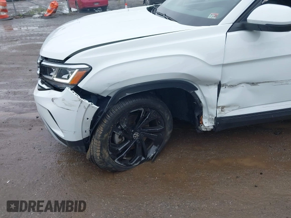 2023 Volkswagen Atlas SE with VIN 1V2HP2CA0PC544469, listed as a IAAI auction lot 42274112 with 19,097 mi miles and . Bid and sale history available at DreamBid. Image 6.